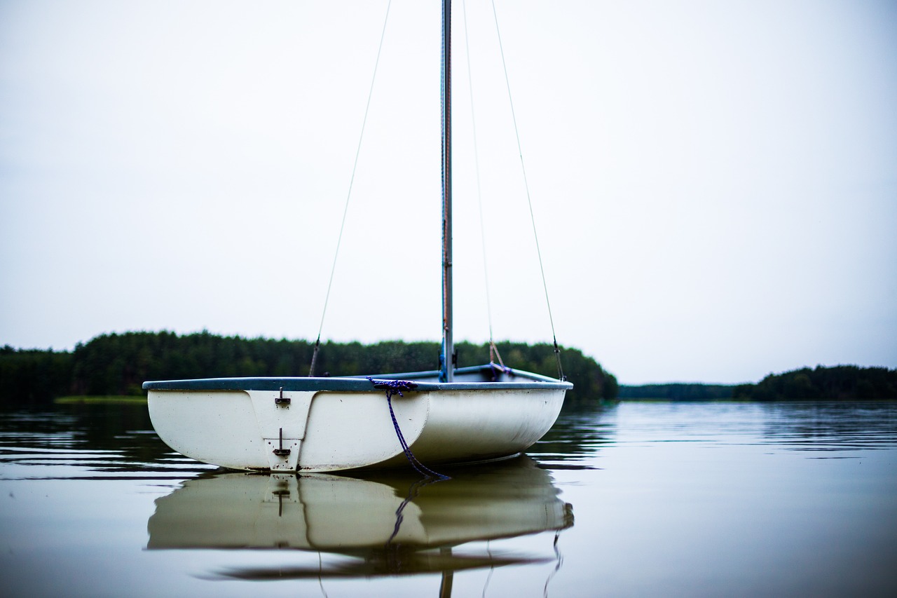 example image Close up image of white sailing dinghy on a calm lake